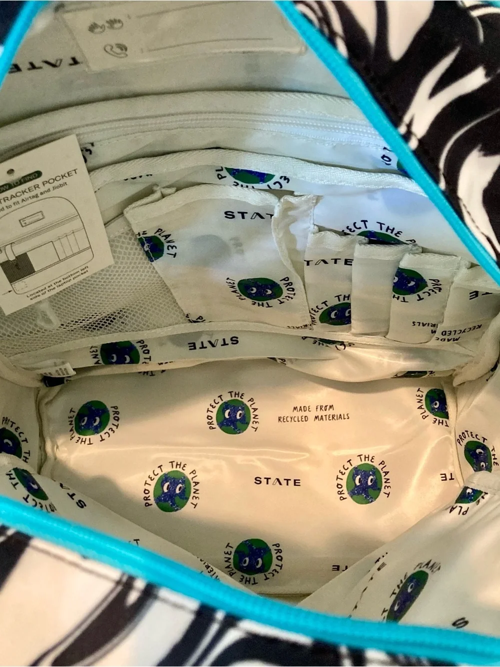 NWT Kane kids double pocket backpack in “paint wave” or “Marbled” print